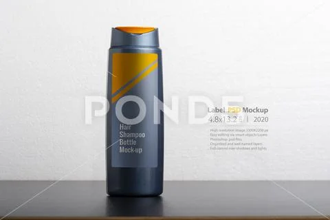 Hair shampoo bottle in front of  light gray background mock-up series PSD Template