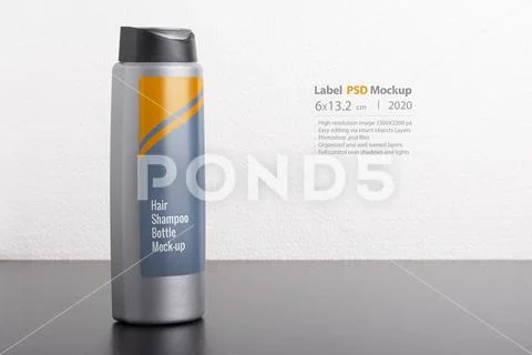Hair shampoo bottle in front of  light gray background mock-up series Modello PSD