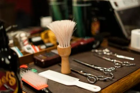 Hairdressing tools arranged on table Stock Photos
