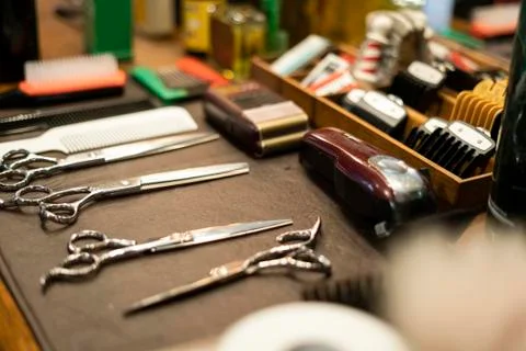 Hairdressing tools arranged on table Stock Photos