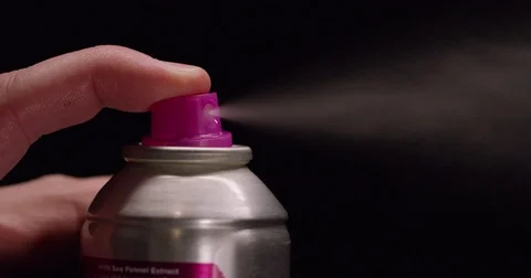 Hairspray being sprayed in slow motion macro Stock Footage 71778667