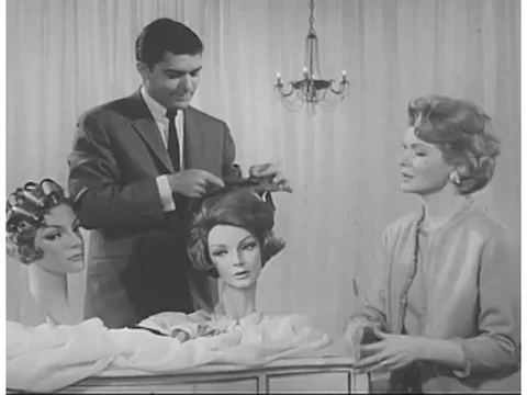 A hairstylist explains the difference the tightness of several different curls, Video stock 74972914