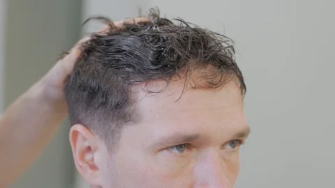 Hairstylist  at work Stock Footage 104876356