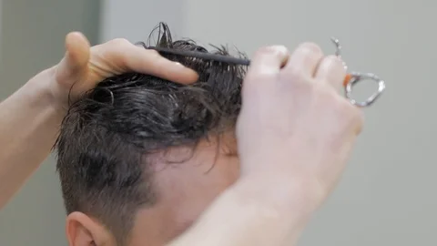 Hairstylist  at work Stock Footage 104876366