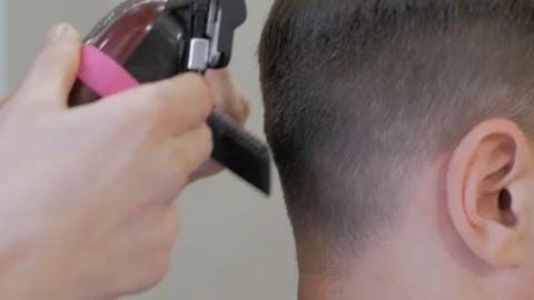 Hairstylist  at work Stock Footage 104876453