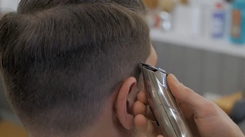 Hairstylist  at work Stock Footage 104876503