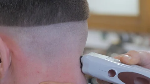 Hairstylist  at work Stock Footage 104876534