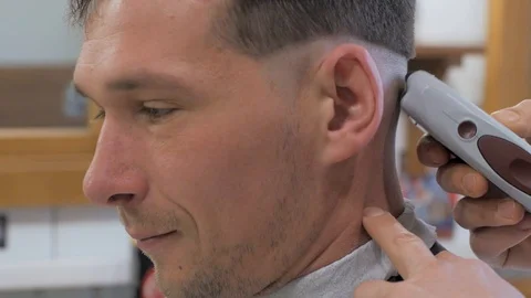Hairstylist  at work Stock Footage 104876542
