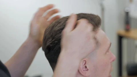 Hairstylist  at work Stock Footage 104876736
