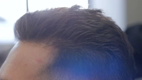 Hairstylist  at work Stock Footage 104876808