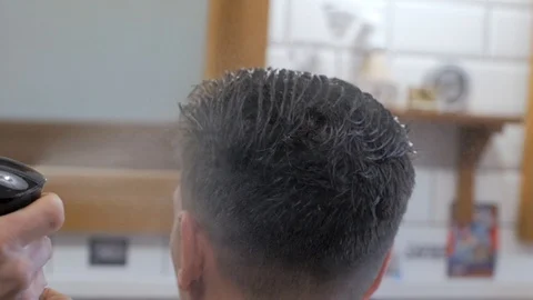 Hairstylist  at work Stock Footage 104876835