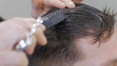 Hairstylist  at work Stock Footage 104876918