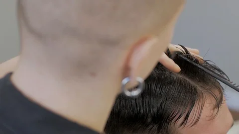 Hairstylist  at work Stock Footage 104876927