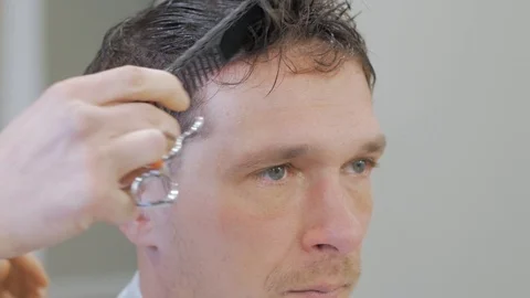 Hairstylist  at work Stock Footage 104876930