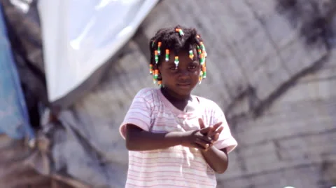 Haiti - Haitian Child (Girl) with beads (children kids) Stock Footage