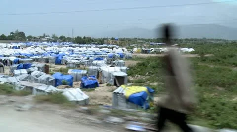 Haiti Tent city driving by steadily Stock Footage