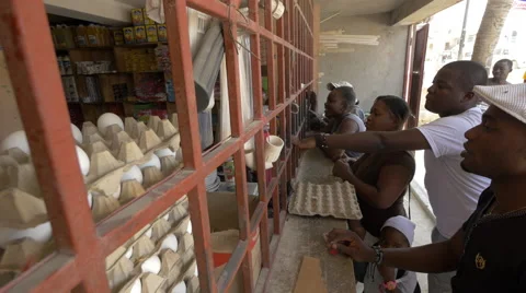 Haitian people buying food from a store in Haiti Stock Footage 50614554