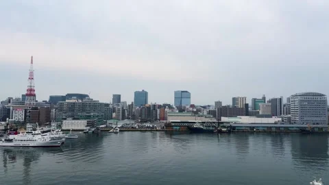 Hakata Port Tower stands out in the cityscape of Fukuoka.  Stock-Footage 334580935
