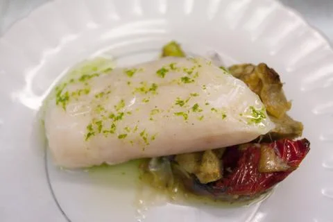 Hake in salsa Foto stock