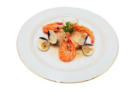 Hake in sauce Stock Photos