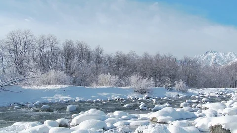 Hakuba mountain and river - time lapse, Hakuba, Nagano Prefecture, Japan. Video stock 100998937
