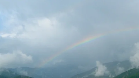 Hakuba mountain with rainbow - Timelapse in Hakuba, Nagano Prefecture, Japan. Video stock 100308592