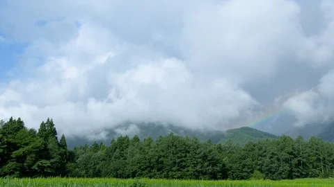 Hakuba mountain with rainbow - Timelapse in Hakuba, Nagano Prefecture, Japan. Video stock 100308693