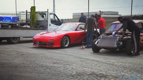 Hal Far, Malta - April 20, 2019; An old and powerful drag race monster car is dr Video stock 108853920