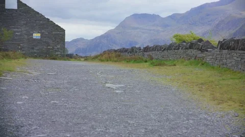 Haldheld camera walking on mountain path Vidéo 75597116