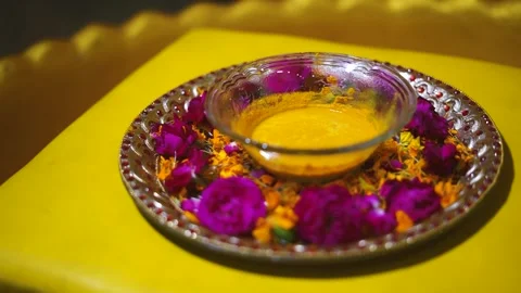 Haldi Paste in Decorative Plate for Indian Wedding Ceremony Stock Footage 329384616