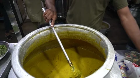 Haleem Stirring in Large Pot Thick Curry Street Style Video stock 332424015