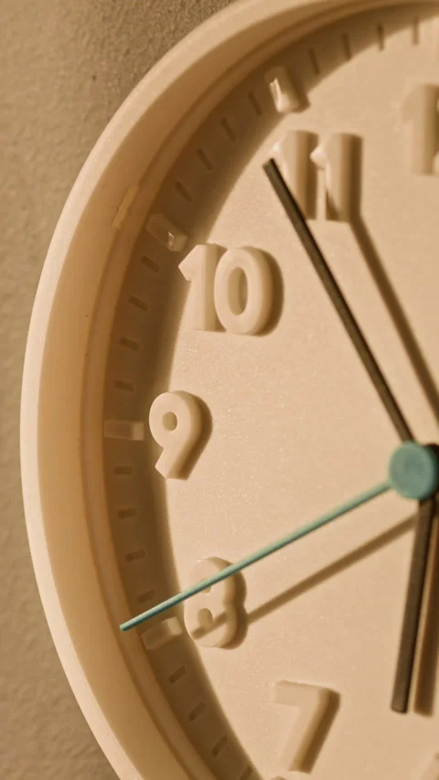 Half Analog Clock on Wall with Spinning Hands Vertical Stock Footage 335865710