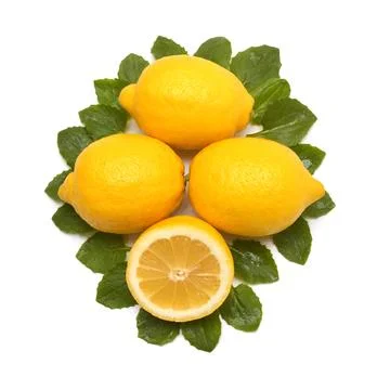Half and whole lemon fruit tropical with leaves isolated on white backgroun.. Stock Photos