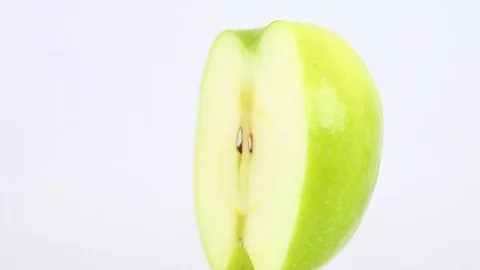 Half apple core one vertically rotate 스톡 동영상 129764023
