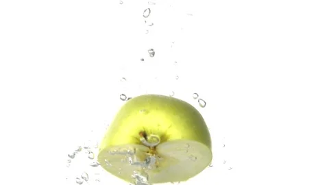 Half Apple Slice Splash Falling Down Into  Water Stock Footage 143256905