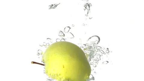 Half Apple Slice Splash Falling Down Into  Water Stock Footage 143256908