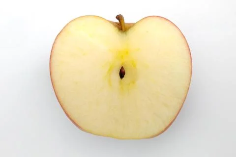 Half an apple on a white background top view Stock Photos