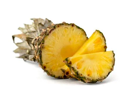 Half aromatic sun-colored pineapple Stock Photos