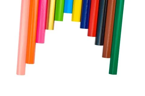 A half arrow shape made with some different colored wood pencil crayons on a Stock Photos