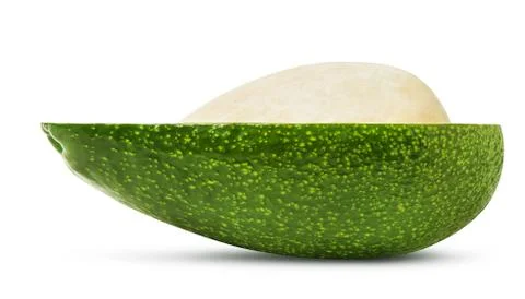 Half of avocado fruit isolated Stock Photos