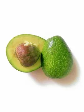 Half avocado isolated on white background Stock Photos