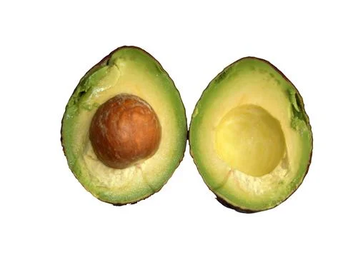 Half an avocado isolated on white Фото