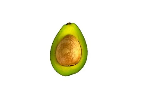 Half an avocado with a stone Stock Photos