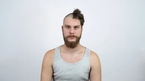 Half bald man looking at the camera.For advertising means against baldness. Stock Footage 122210927