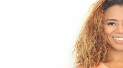 Half Of Black  Woman's Face In Studio Smiling At Camera 스톡 동영상 56035285