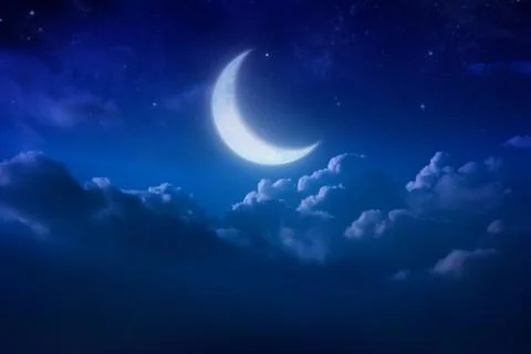 Half blue moon behind cloudy on sky and star at night. Outdoors at night. lun Stock Photos