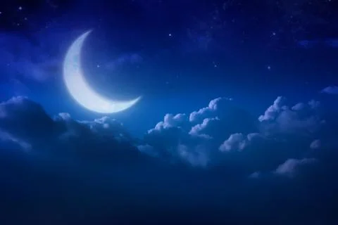 Half blue moon behind cloudy on sky and star at night. Outdoors at night. lun Stock Photos