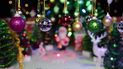 On a half-blurred Christmas background with New Year decorations swinging slowly Stock Footage 255912765