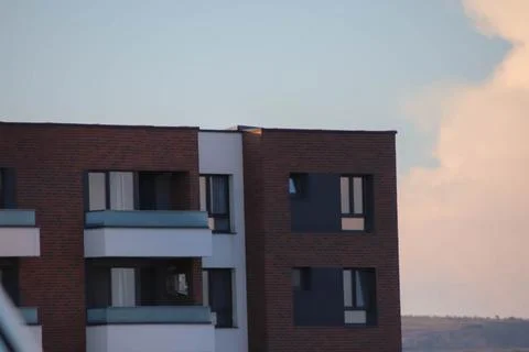 Half of building and sky Stock Photos