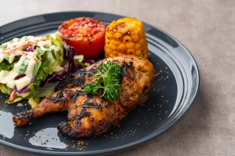 Half chicken baked Stock Photos